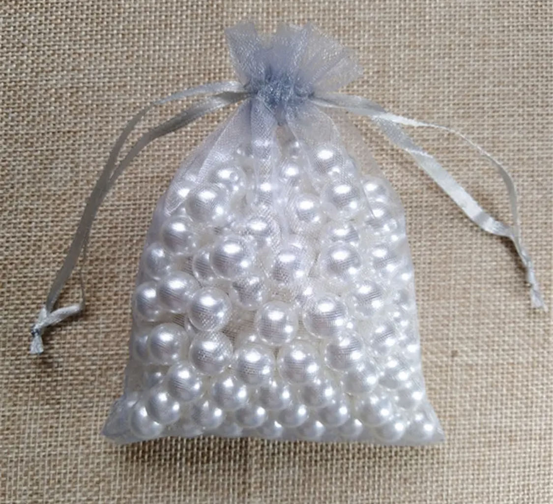 12 pezzi sacchetti organza 7x9cm